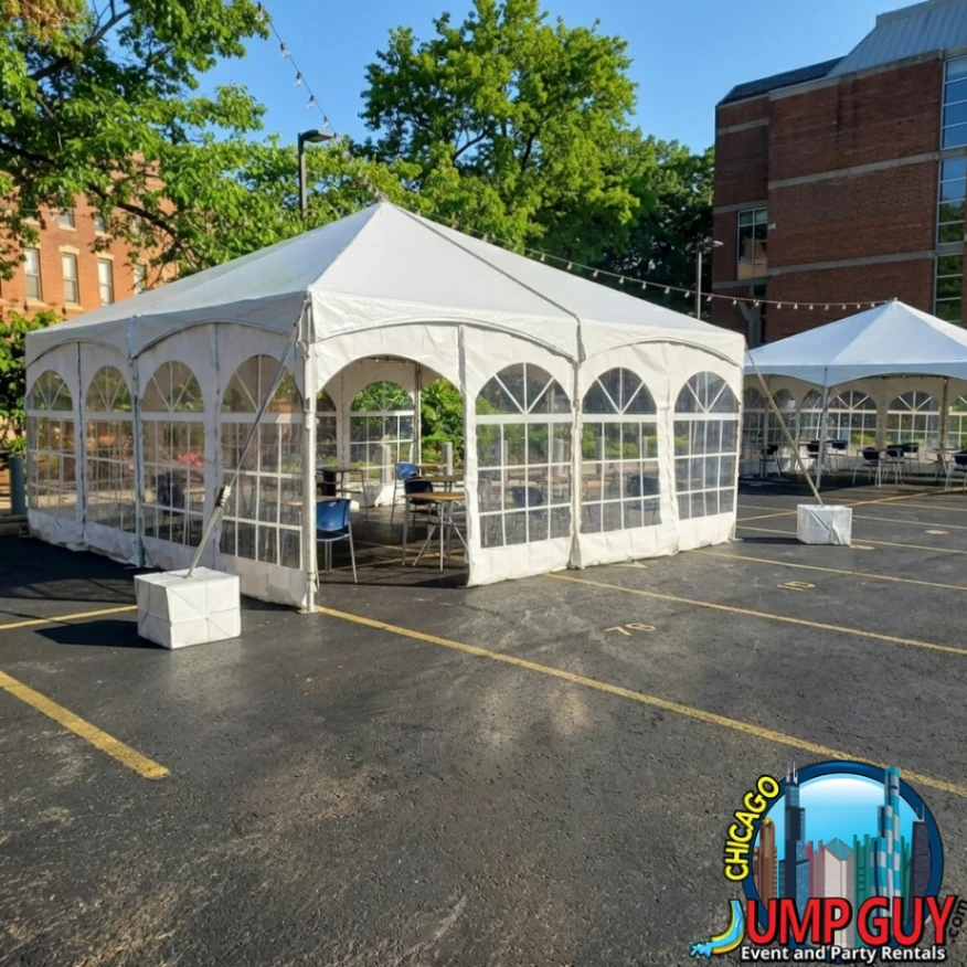 20x20 Keder frame tent rental with clear sidewalls set up in a paved parking lot for a backyard event in Elmhurst IL 60126