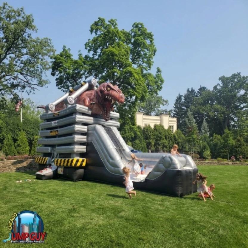 T Rex Dinosaur themed bounce house and slide combo dry inflatable rental for Elmhurst IL boys birthday parties ages 4 to 10