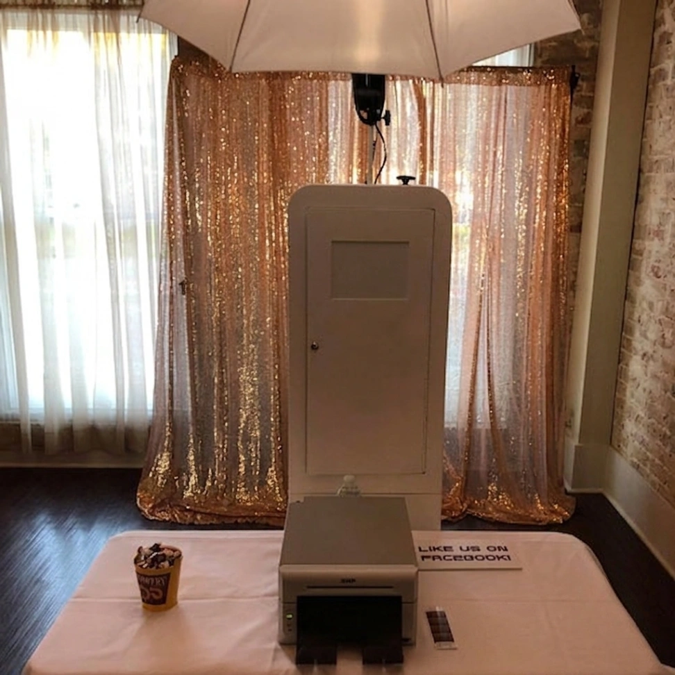 Platinum package photo booth rental with custom prints for Chalmette LA weddings and quinceaneras